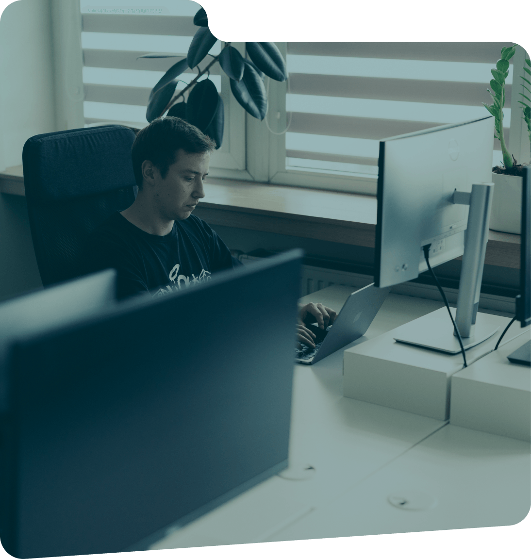 ULAM LABS engineers building a FinTech platform at a workstation