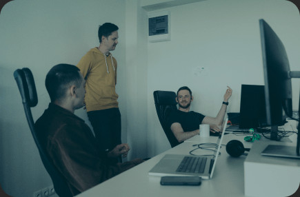 ULAM LABS team collaborating in the office