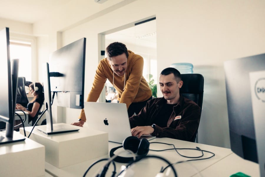 ULAM LABS engineers collaborating on a regulated-software project